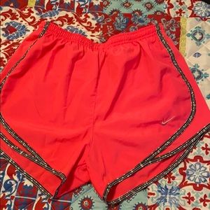 Hot pink Nike running shorts
